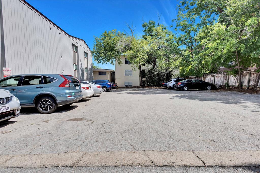 2207 Leon Street, Unit 303 Austin, TX 78705 - Photo 12 of 12 a view of a cars parked in front of a house