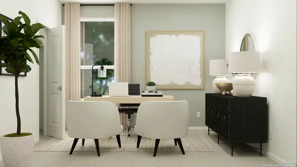 a dining room with furniture and window