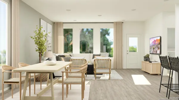 a view of a livingroom with furniture and window
