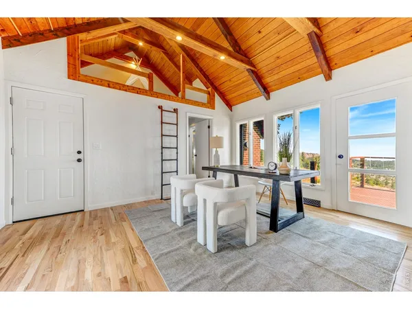 a view of a livingroom with furniture and wooden floor