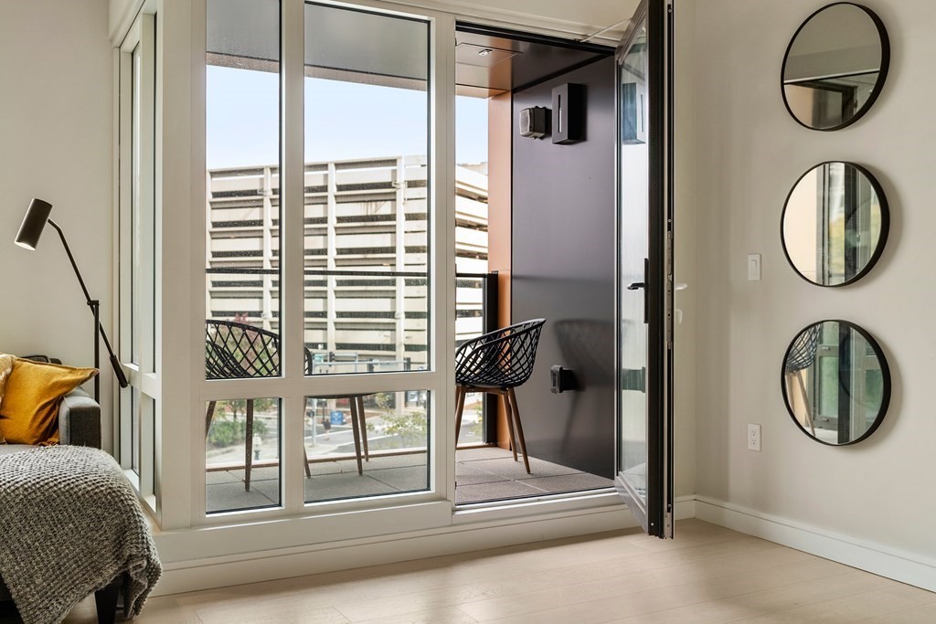 110 Broad Street, Unit 401 Boston, MA 02110 - Photo 14 of 24 a very nice looking room with a large window and outer view