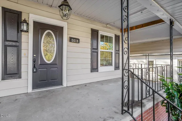 a front view of a house with a porch