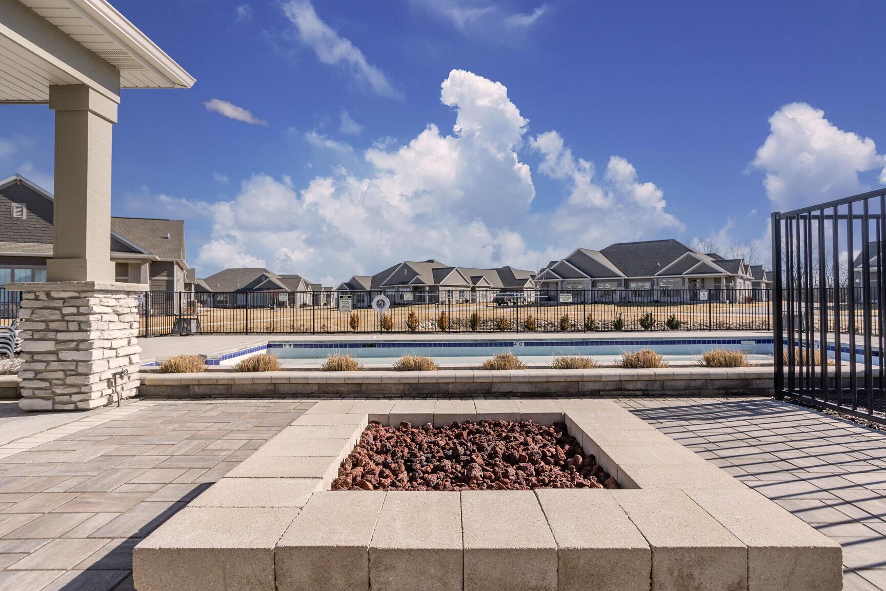 N28-w25285 Pkwy Rdg Circle, Unit C Pewaukee, WI 53072 - Photo 33 of 41 Fire Pit overlooking Pool