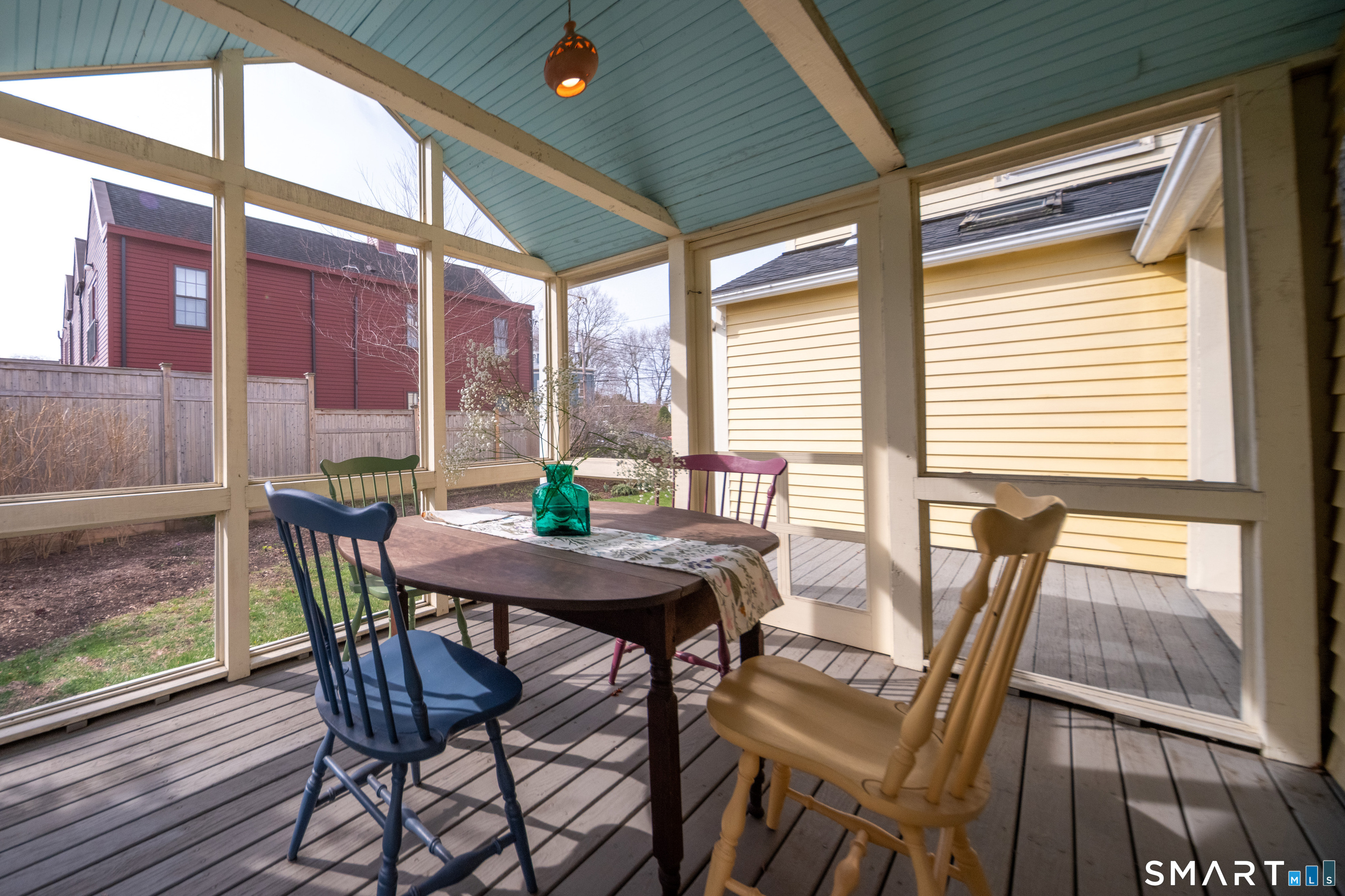 95 Fair Street Guilford, CT 06437 - Photo 16 of 40 a view of a dining room with furniture and wooden floor