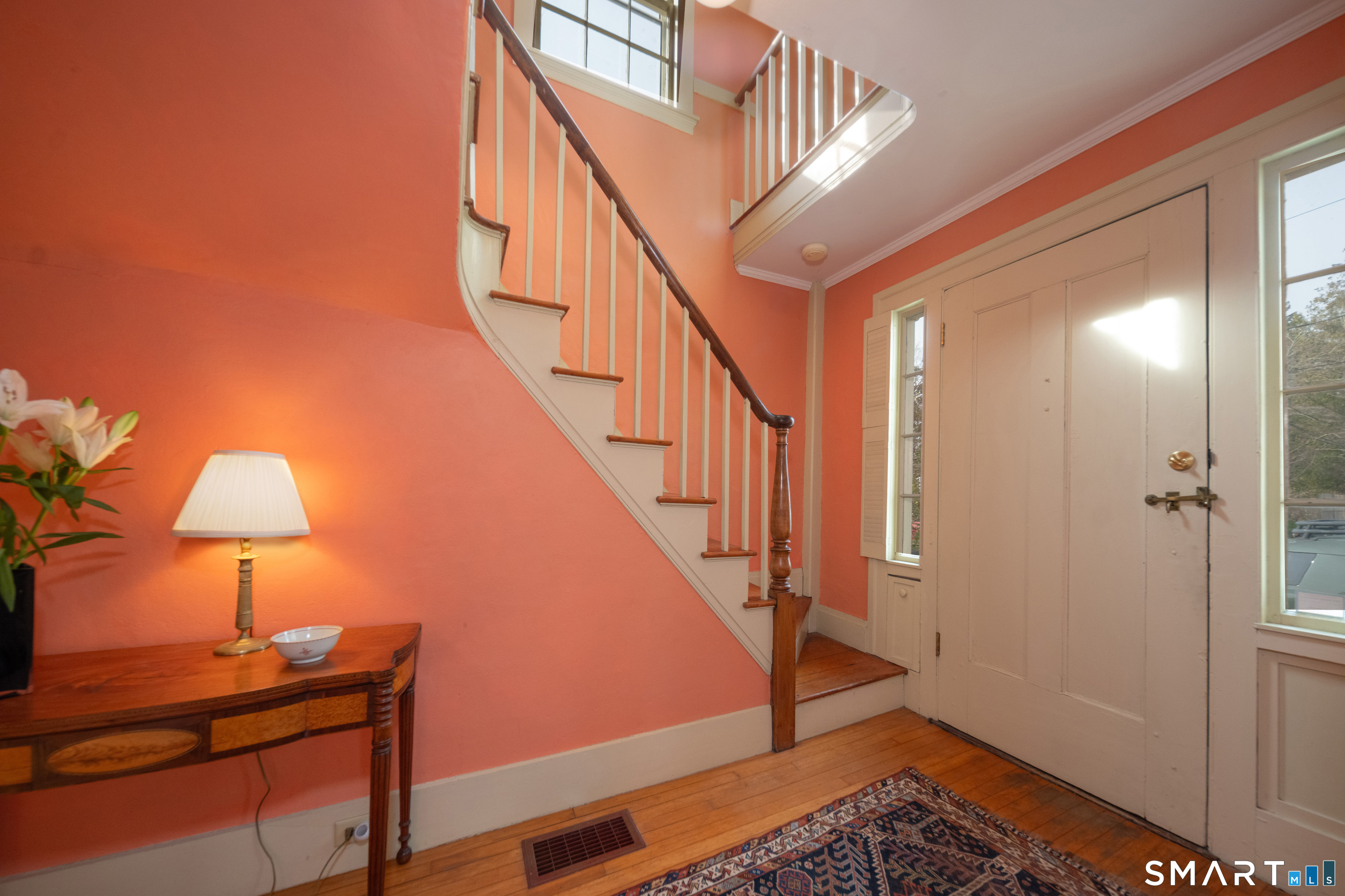 95 Fair Street Guilford, CT 06437 - Photo 19 of 40 a view of entryway and hall with wooden floor
