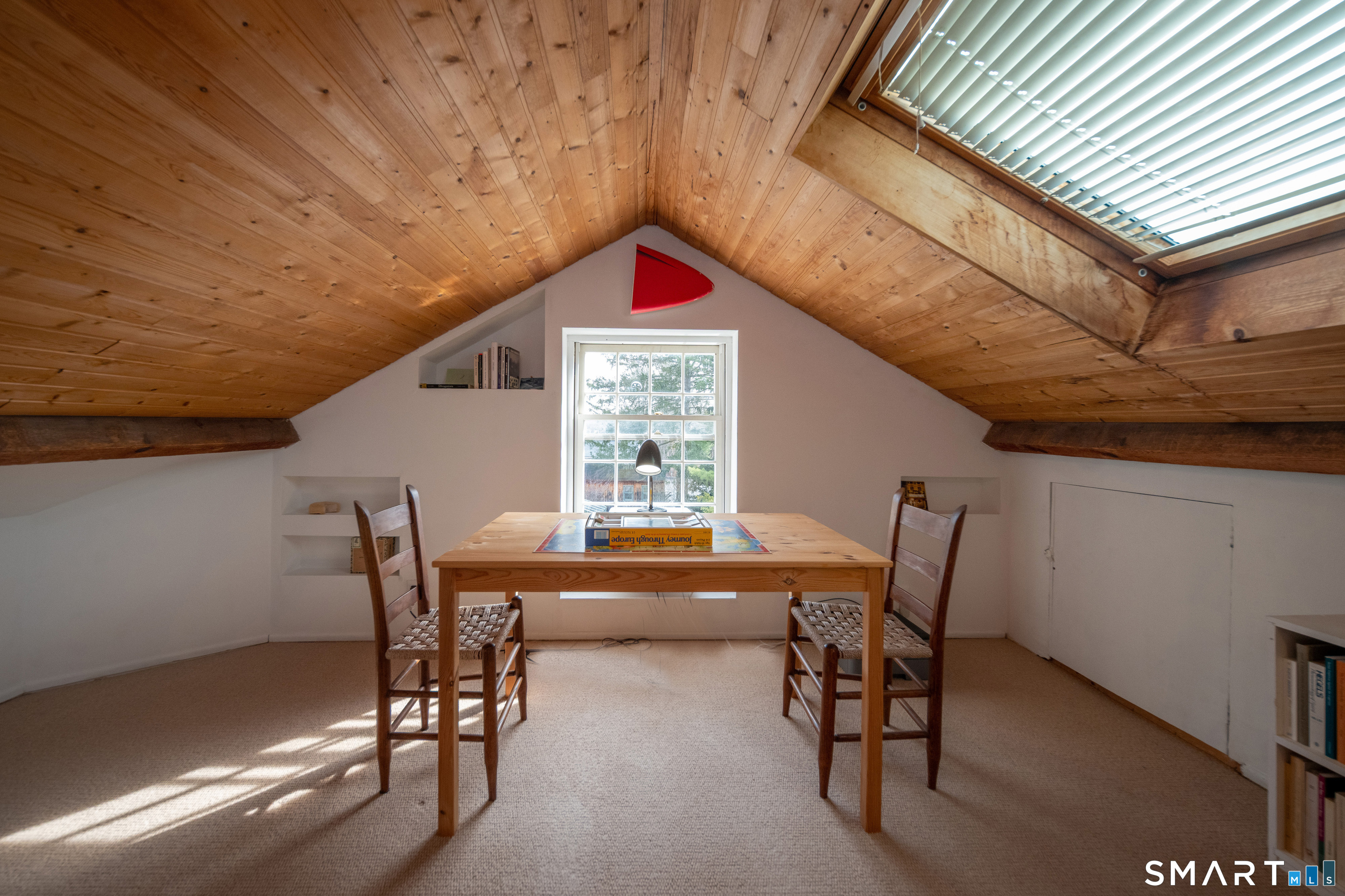 95 Fair Street Guilford, CT 06437 - Photo 30 of 40 a view of a dining room with furniture and window
