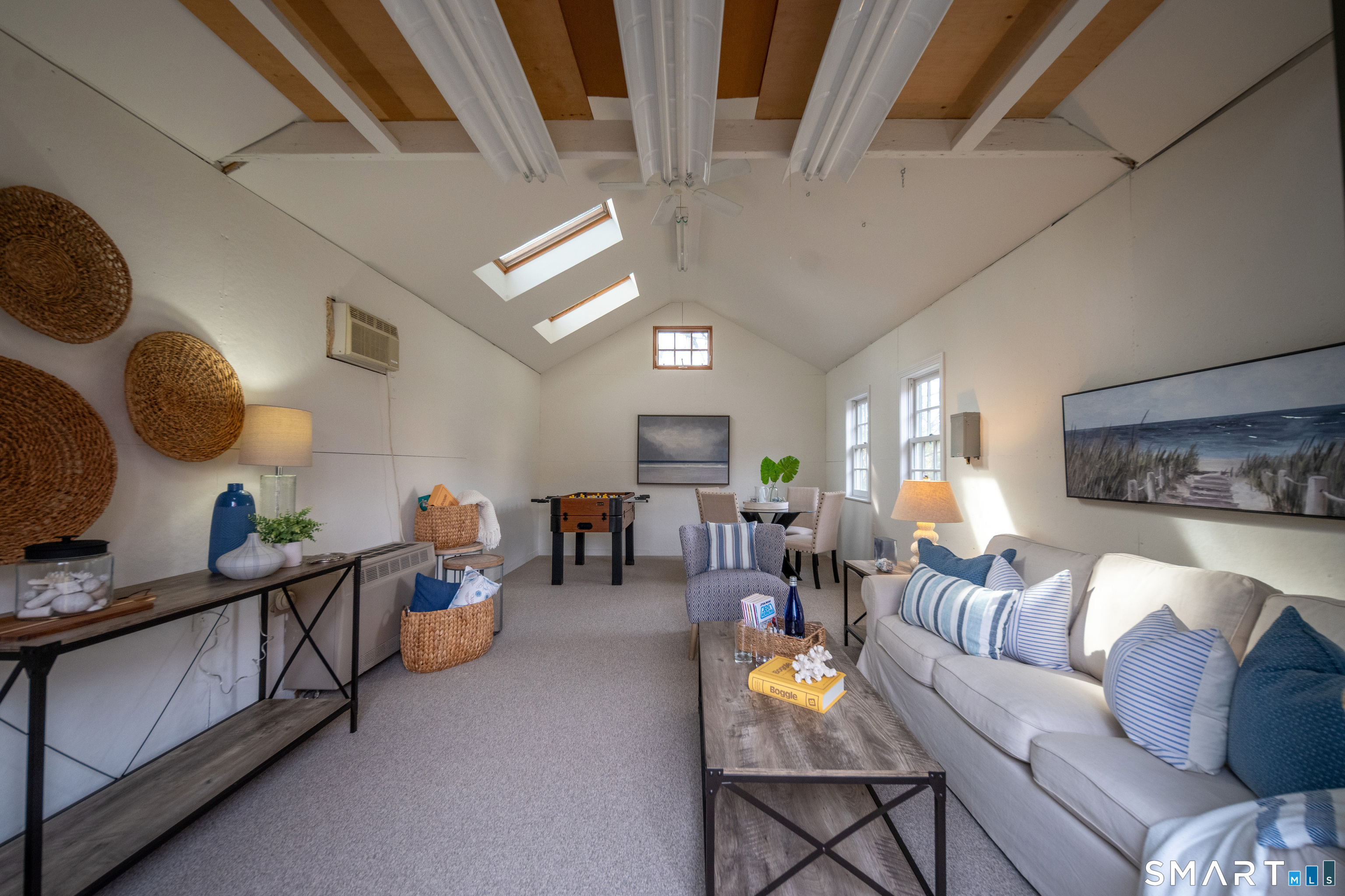 95 Fair Street Guilford, CT 06437 - Photo 35 of 40 a living room with furniture and a mirror