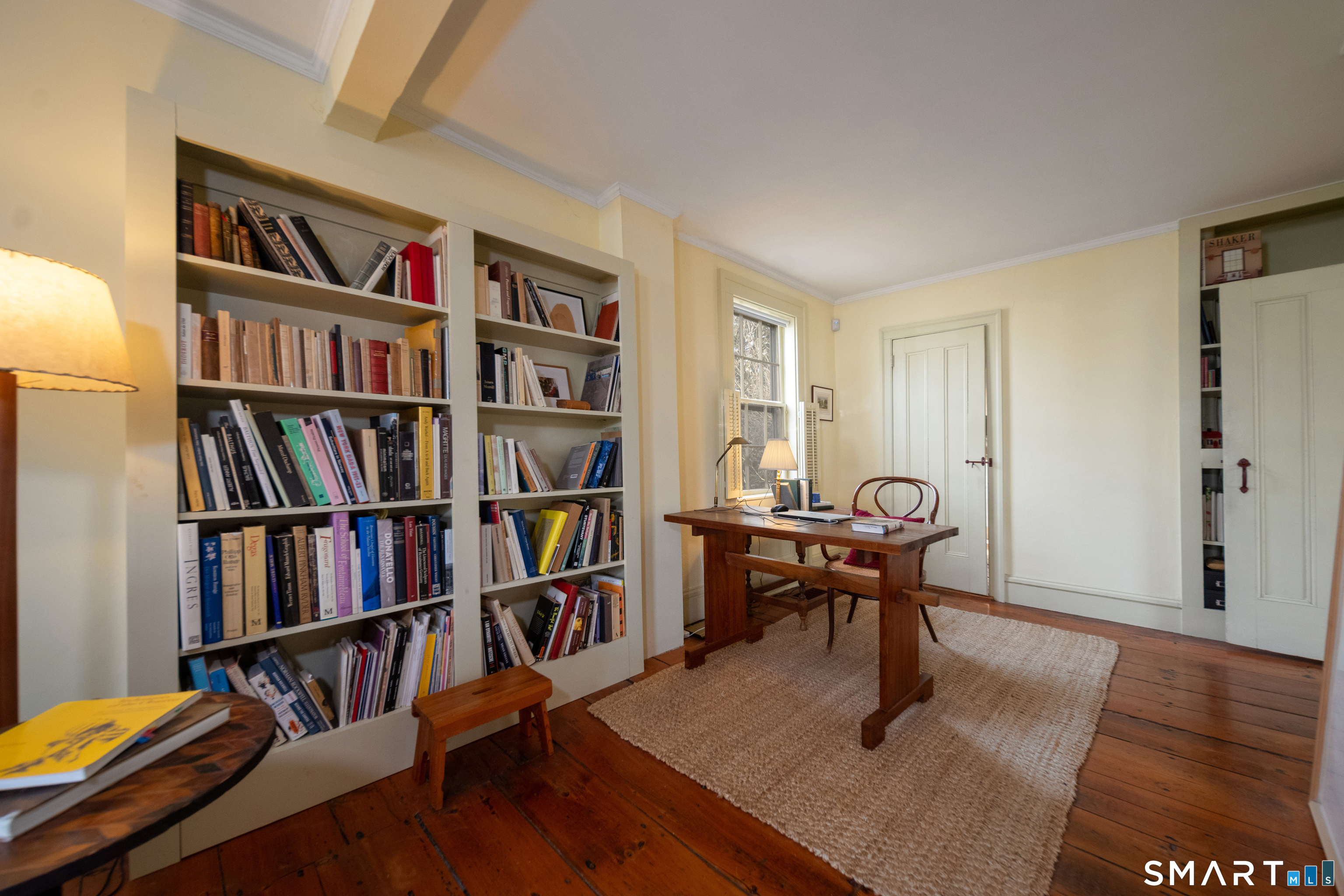 95 Fair Street Guilford, CT 06437 - Photo 7 of 40 a view of a workspace with furniture and bathroom