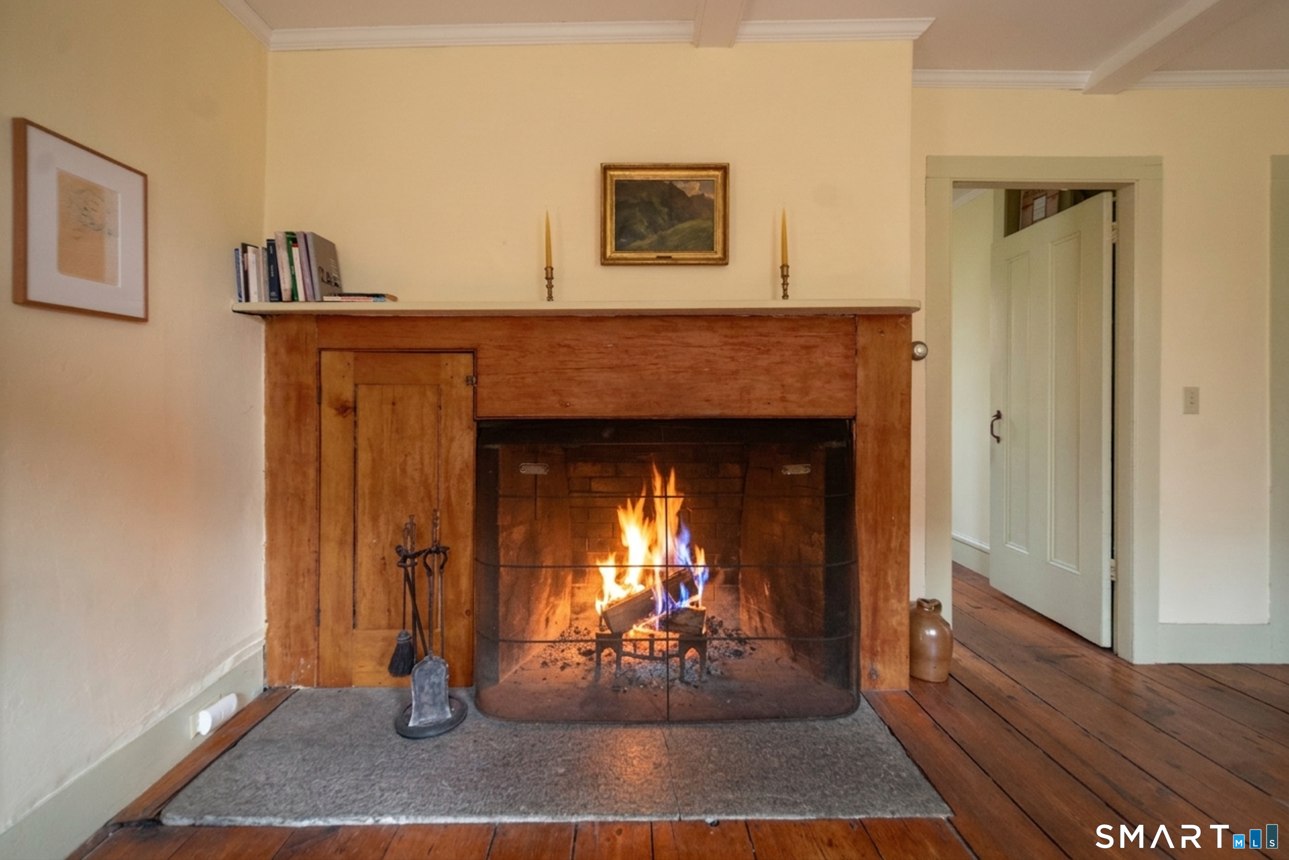 95 Fair Street Guilford, CT 06437 - Photo 9 of 40 a living room with furniture and a fireplace