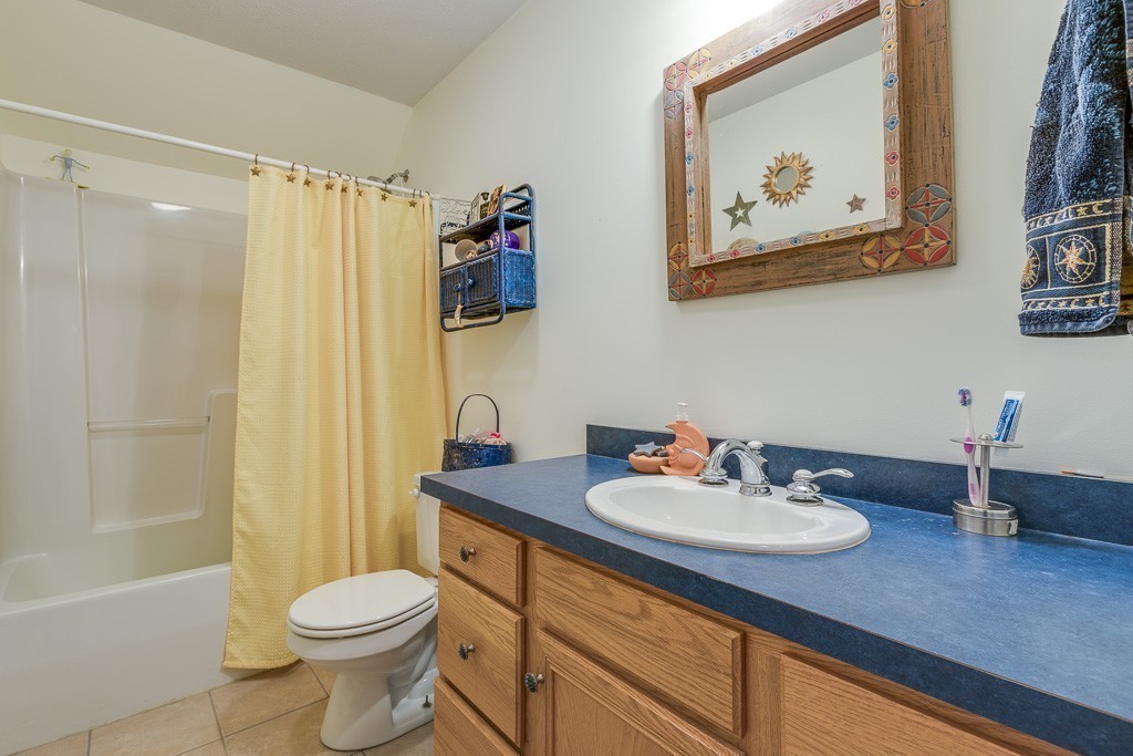 58 Mixter Road Holden, MA 01520 - Photo 23 of 30 a bathroom with a sink toilet and shower
