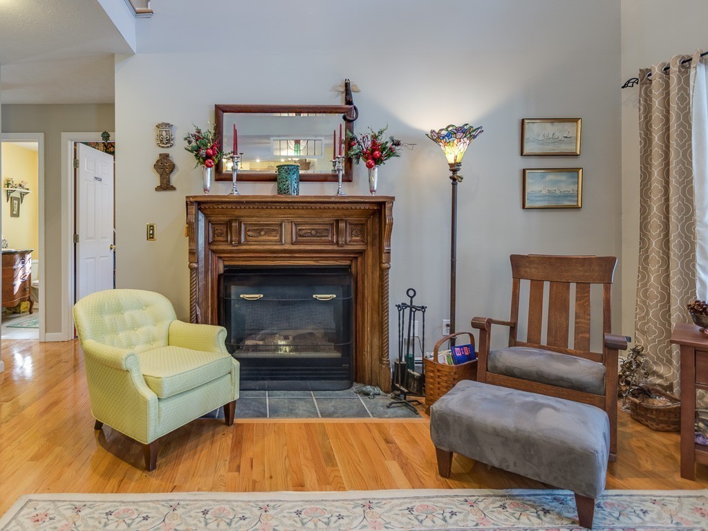 58 Mixter Road Holden, MA 01520 - Photo 7 of 30 a living room with furniture and a fireplace