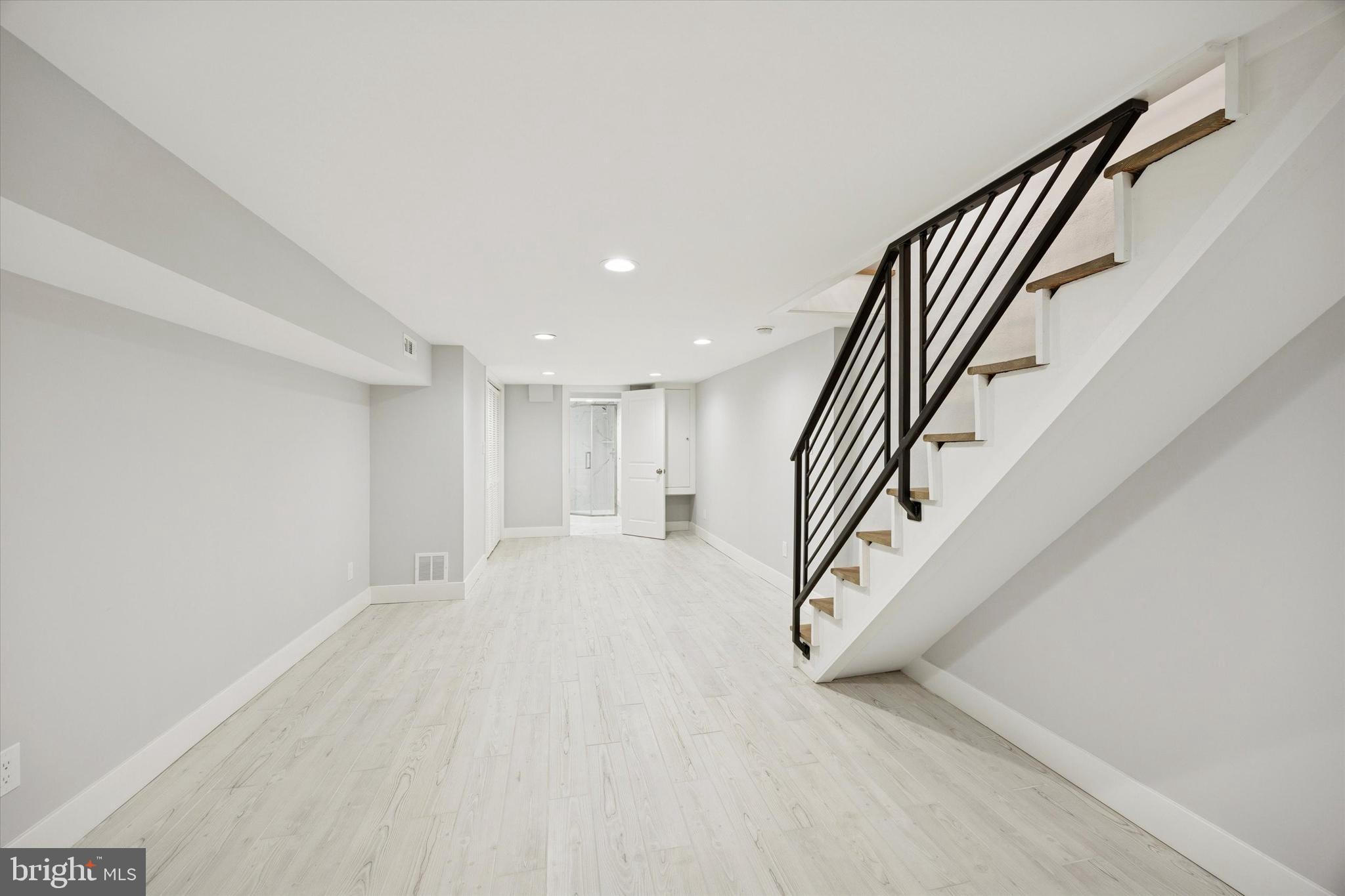 2869 Aramingo Avenue Philadelphia, PA 19134 - Photo 21 of 25 an entryway in hall with staircase