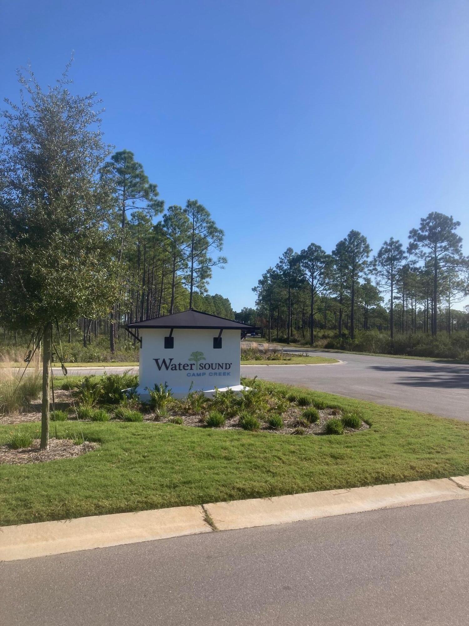 Lot 13 Golfridge Drive Watersound, FL 32461 - Photo 11 of 14 front view of a house with a yard