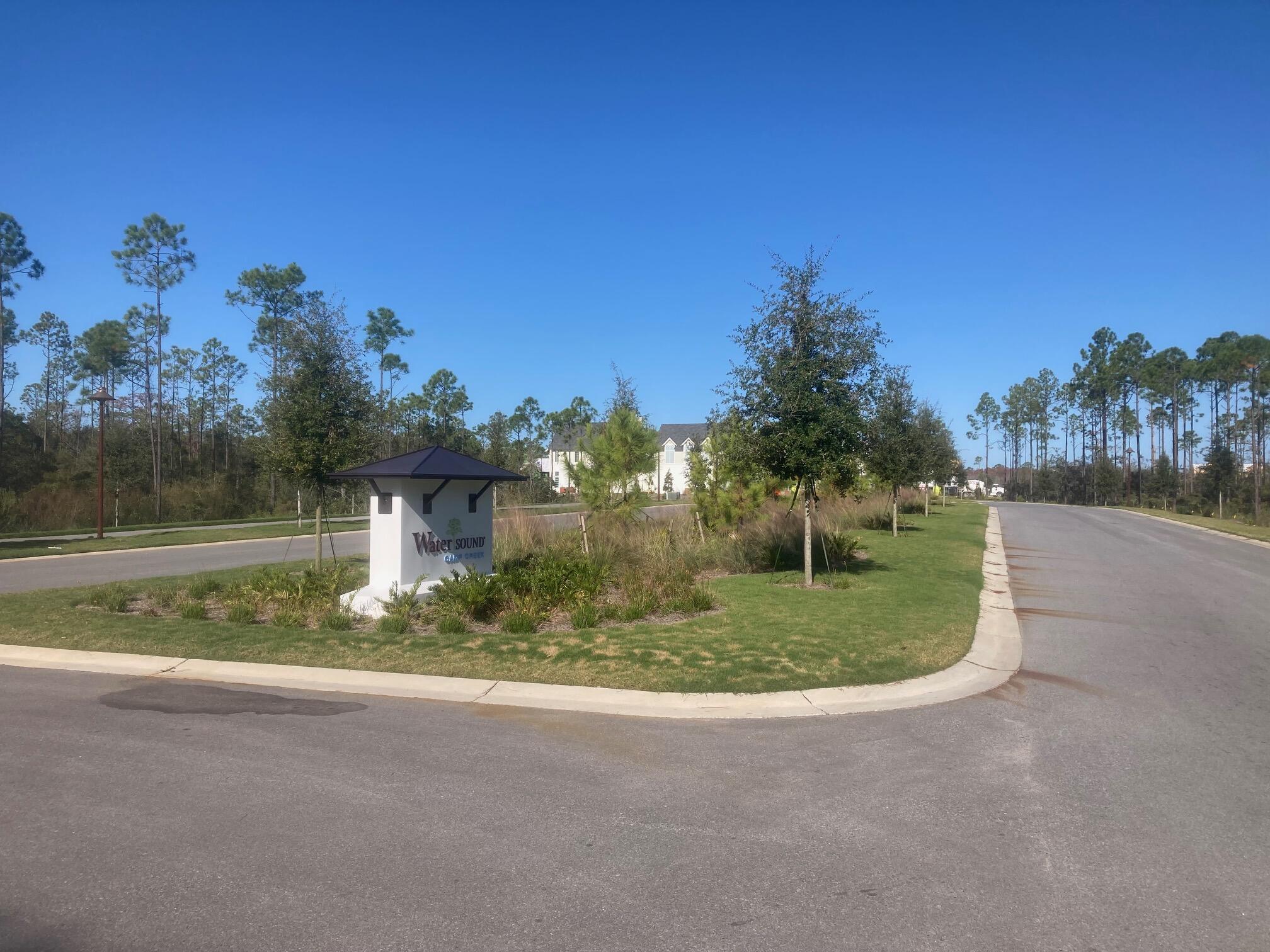 Lot 13 Golfridge Drive Watersound, FL 32461 - Photo 12 of 14 a view of a house with a yard and a street view