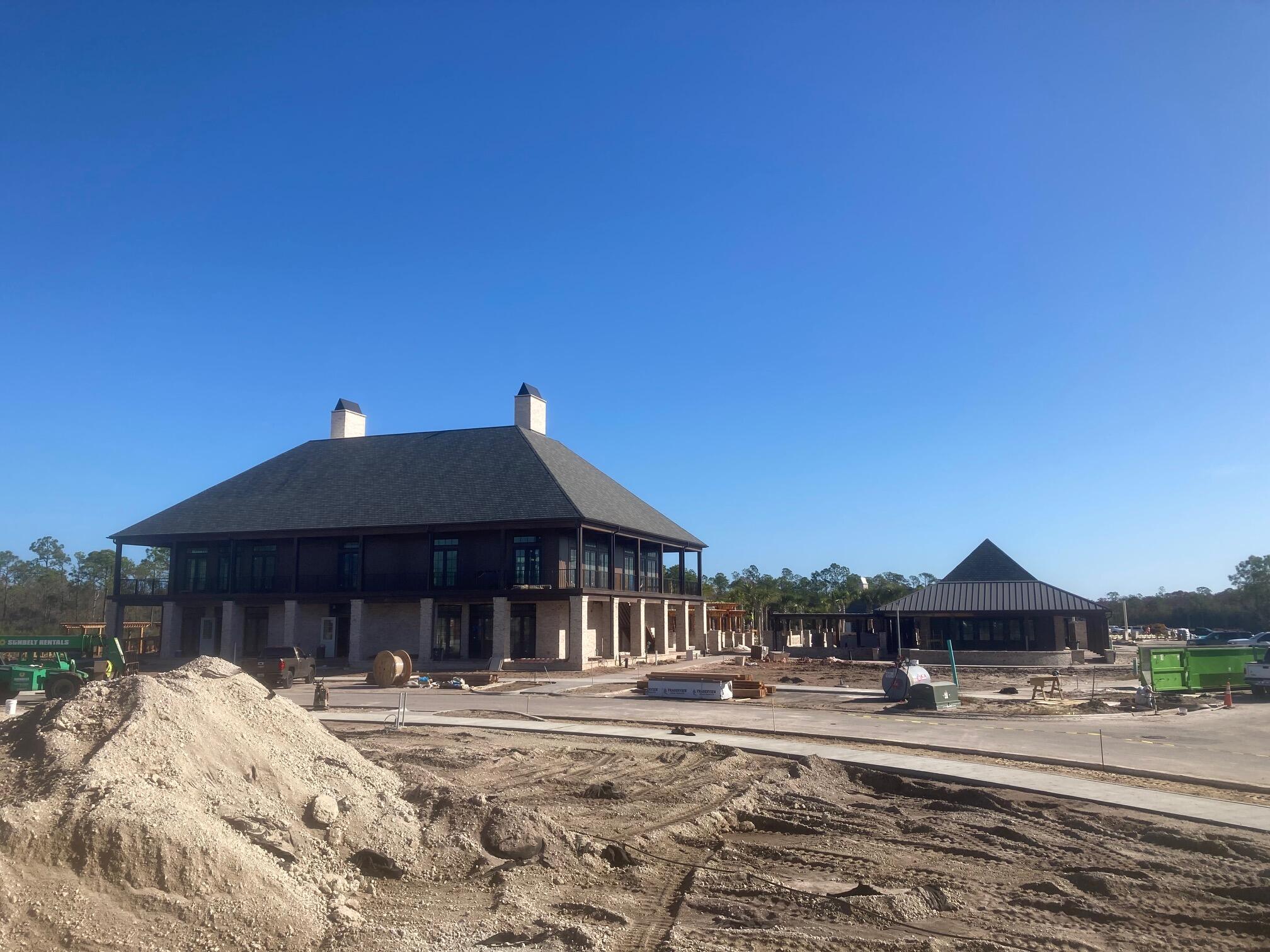 Lot 13 Golfridge Drive Watersound, FL 32461 - Photo 4 of 14 a front view of a house with a yard