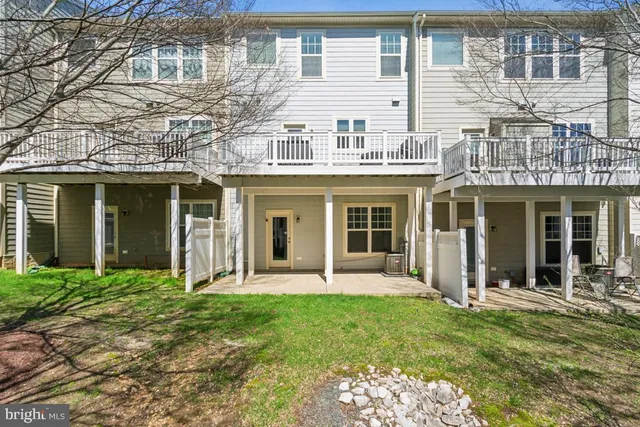 front view of a building with a yard