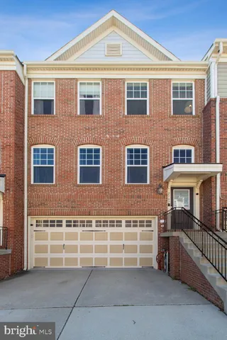a front view of a house with a glass door