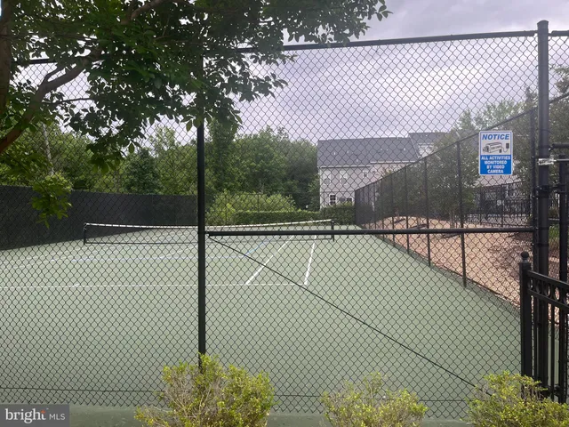 a view of a tennis court with a tennis court