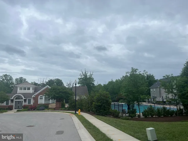 a view of multiple houses with a city street
