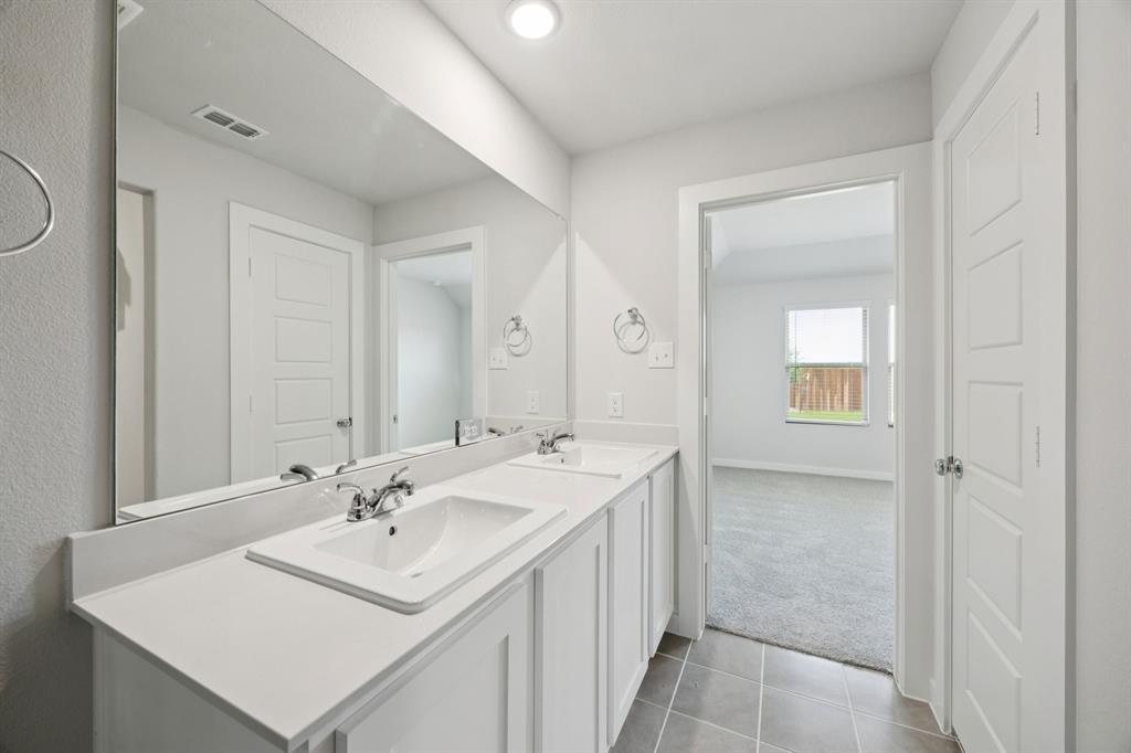 853 Rockcloud Drive Haslet, TX 76052 - Photo 14 of 27 Primary Bathroom in the Hadley home plan by Trophy Signature Homes – REPRESENTATIVE PHOTO