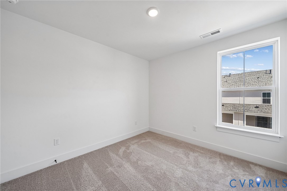 12042 Flowering Lavender Loop Henrico, VA 23233 - Photo 31 of 46 an empty room with a window