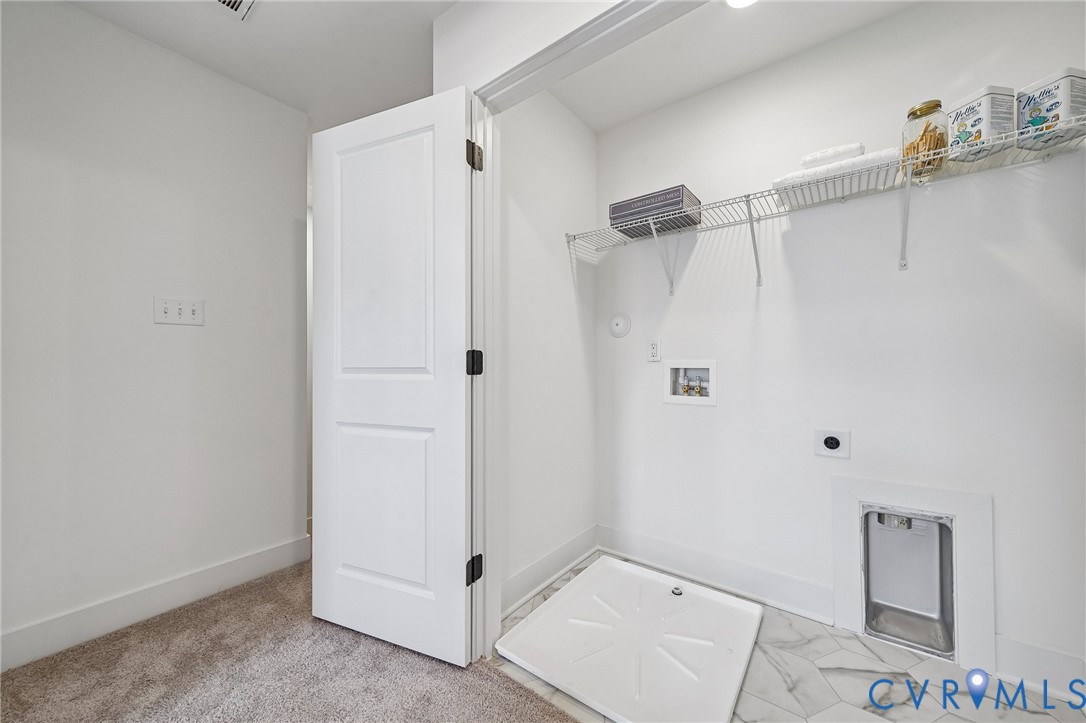 12042 Flowering Lavender Loop Henrico, VA 23233 - Photo 32 of 46 a bathroom with a shower and a sink