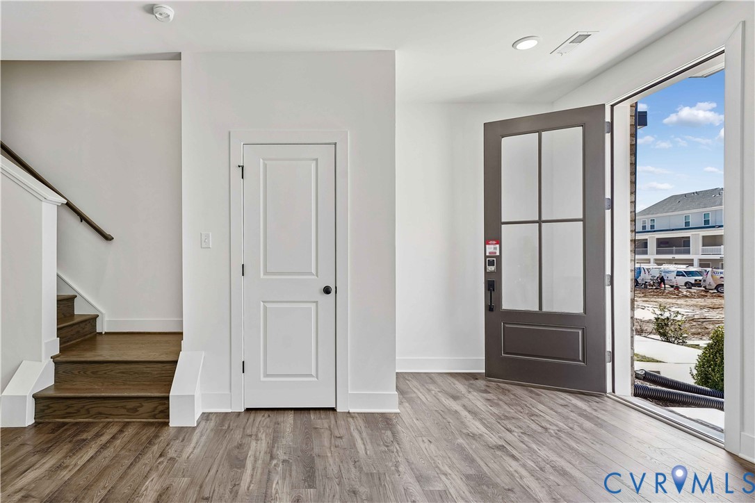 12042 Flowering Lavender Loop Henrico, VA 23233 - Photo 7 of 46 a view of entryway with wooden floor