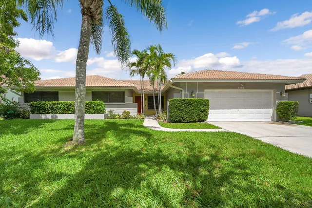 a view of a door with a potted plant