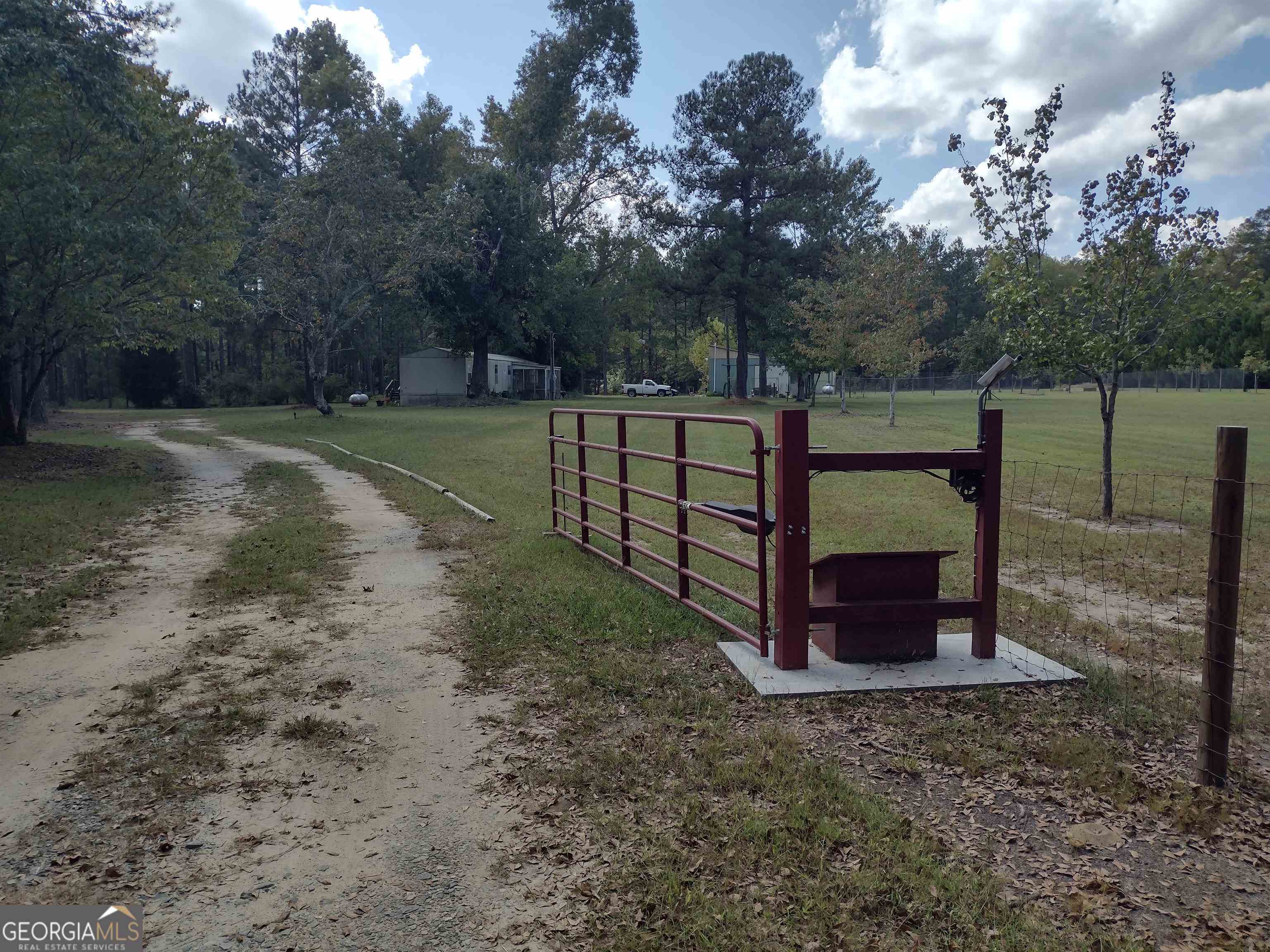 1630 Underwood Road Sparta, GA 31087 - Photo 1 of 1 a view of a bench in a backyard