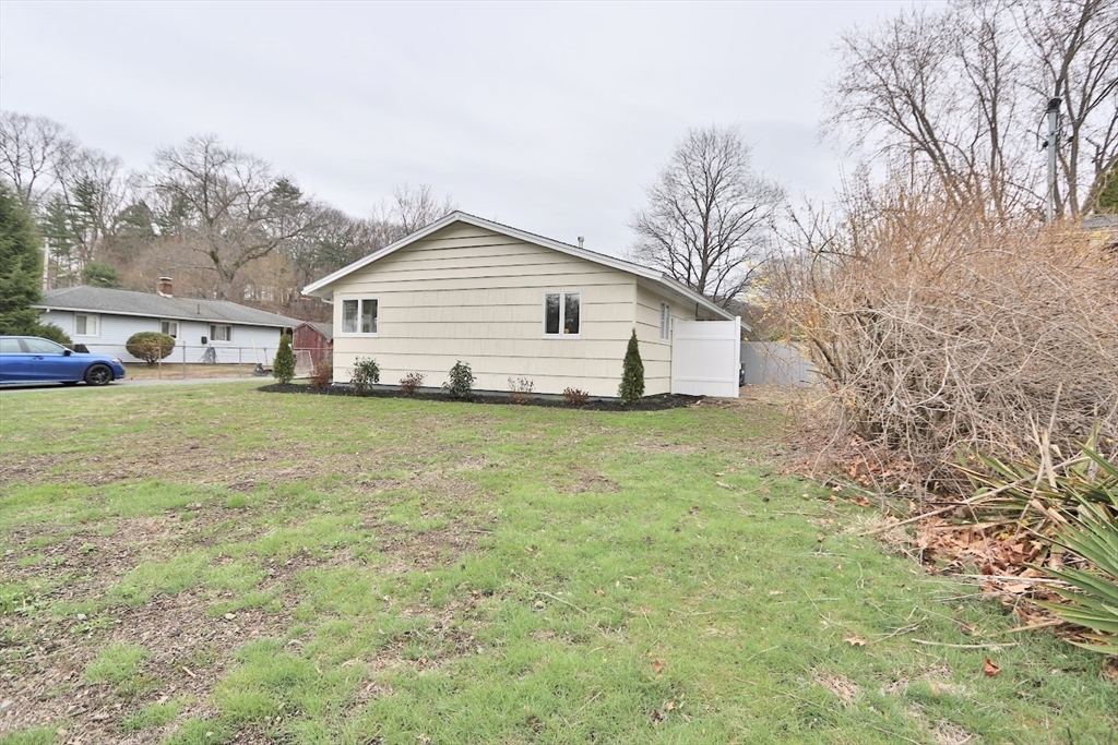 9 Poskus Road Framingham, MA 01701 - Photo 2 of 36 a view of a house with a yard