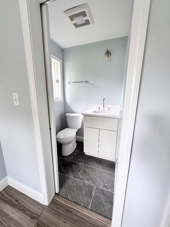 9 Poskus Road Framingham, MA 01701 - Photo 31 of 36 a bathroom with a sink toilet and a mirror
