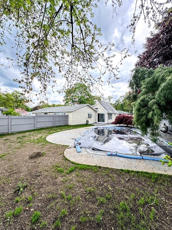 9 Poskus Road Framingham, MA 01701 - Photo 33 of 36 a view of a yard with a tree