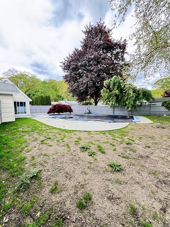 9 Poskus Road Framingham, MA 01701 - Photo 34 of 36 a view of a house with swimming pool and sitting area