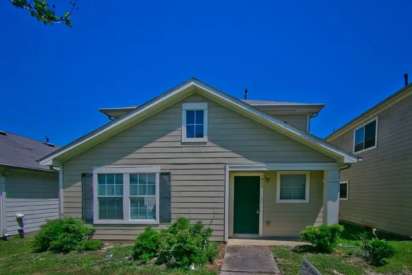 a house view with a outdoor space