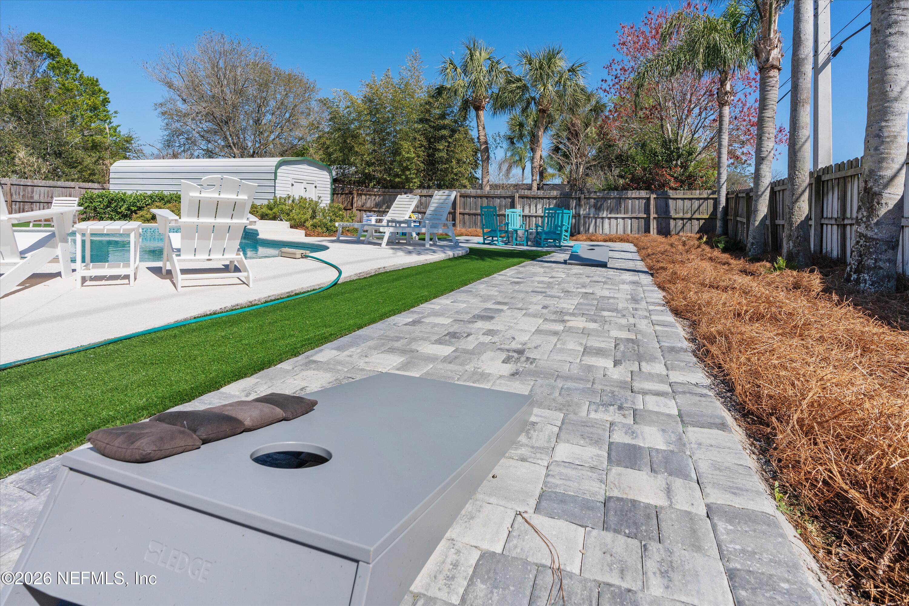 31 Norberta Way Jacksonville Beach, FL 32250 - Photo 17 of 49 a view of a backyard with sitting area