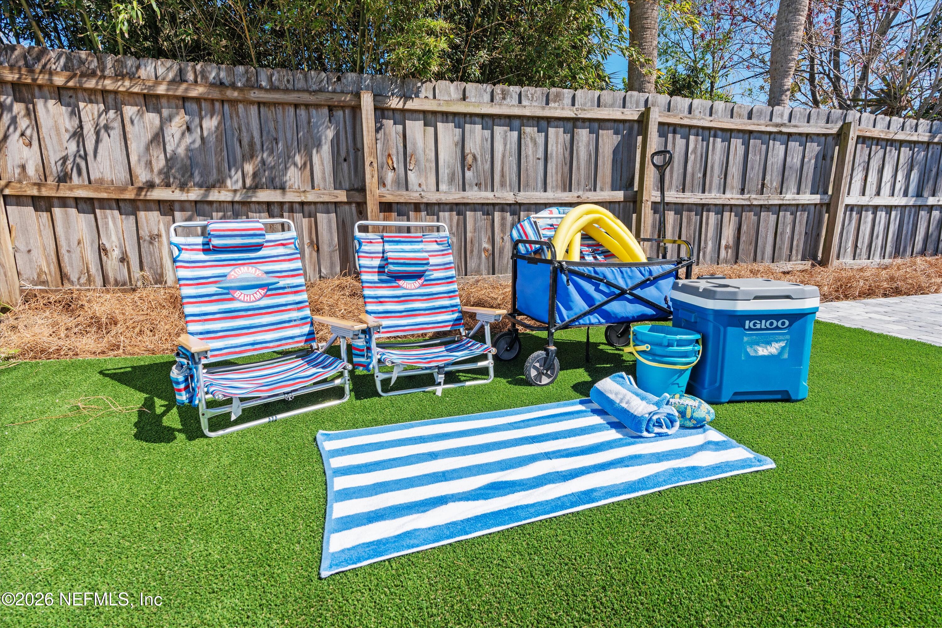 31 Norberta Way Jacksonville Beach, FL 32250 - Photo 19 of 49 a view of a bench in the garden