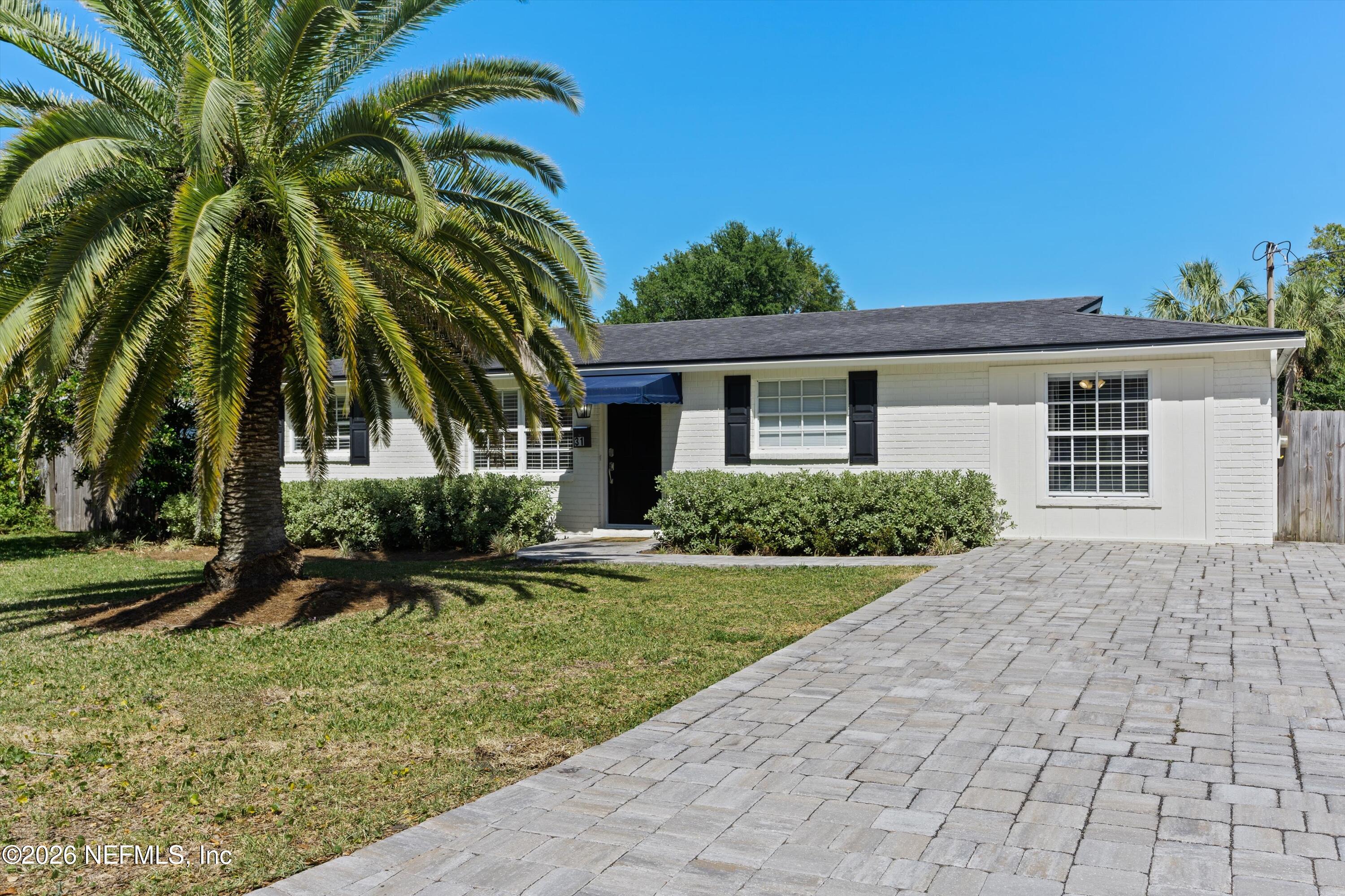 31 Norberta Way Jacksonville Beach, FL 32250 - Photo 22 of 49 a view of a house with a yard