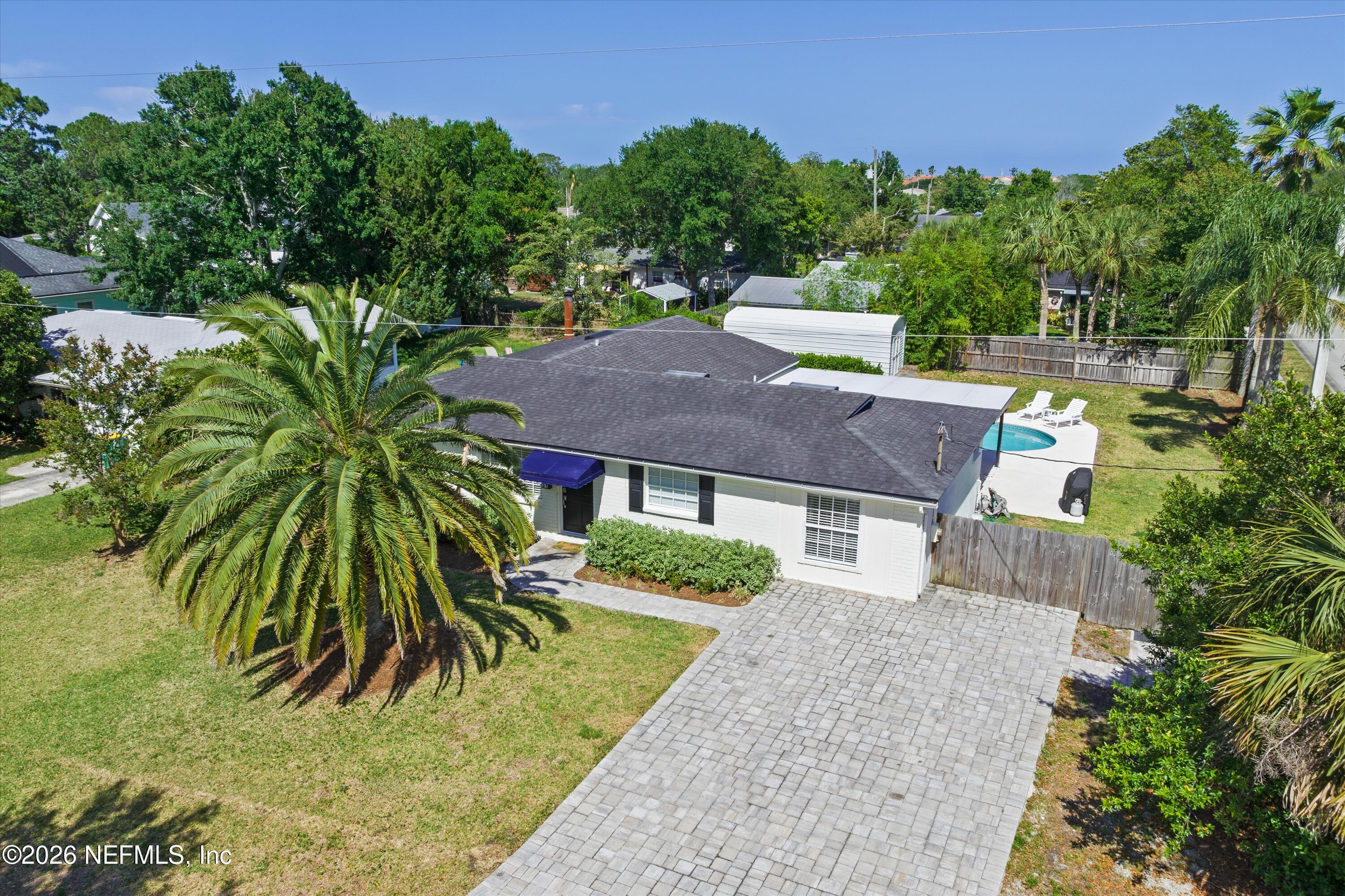 31 Norberta Way Jacksonville Beach, FL 32250 - Photo 25 of 49 a front view of a house with a garden