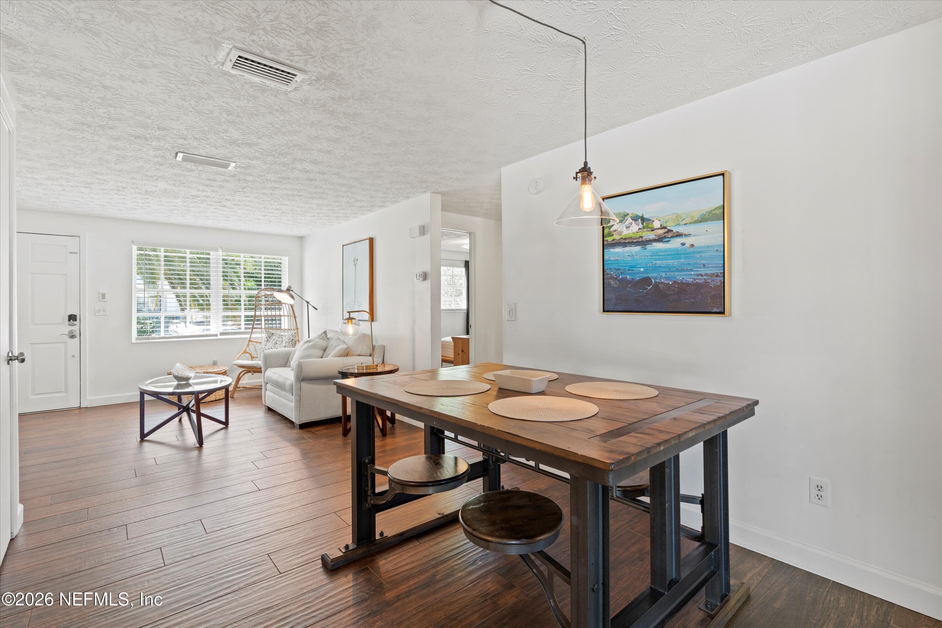 31 Norberta Way Jacksonville Beach, FL 32250 - Photo 27 of 49 a view of a dining room with furniture window and wooden floor