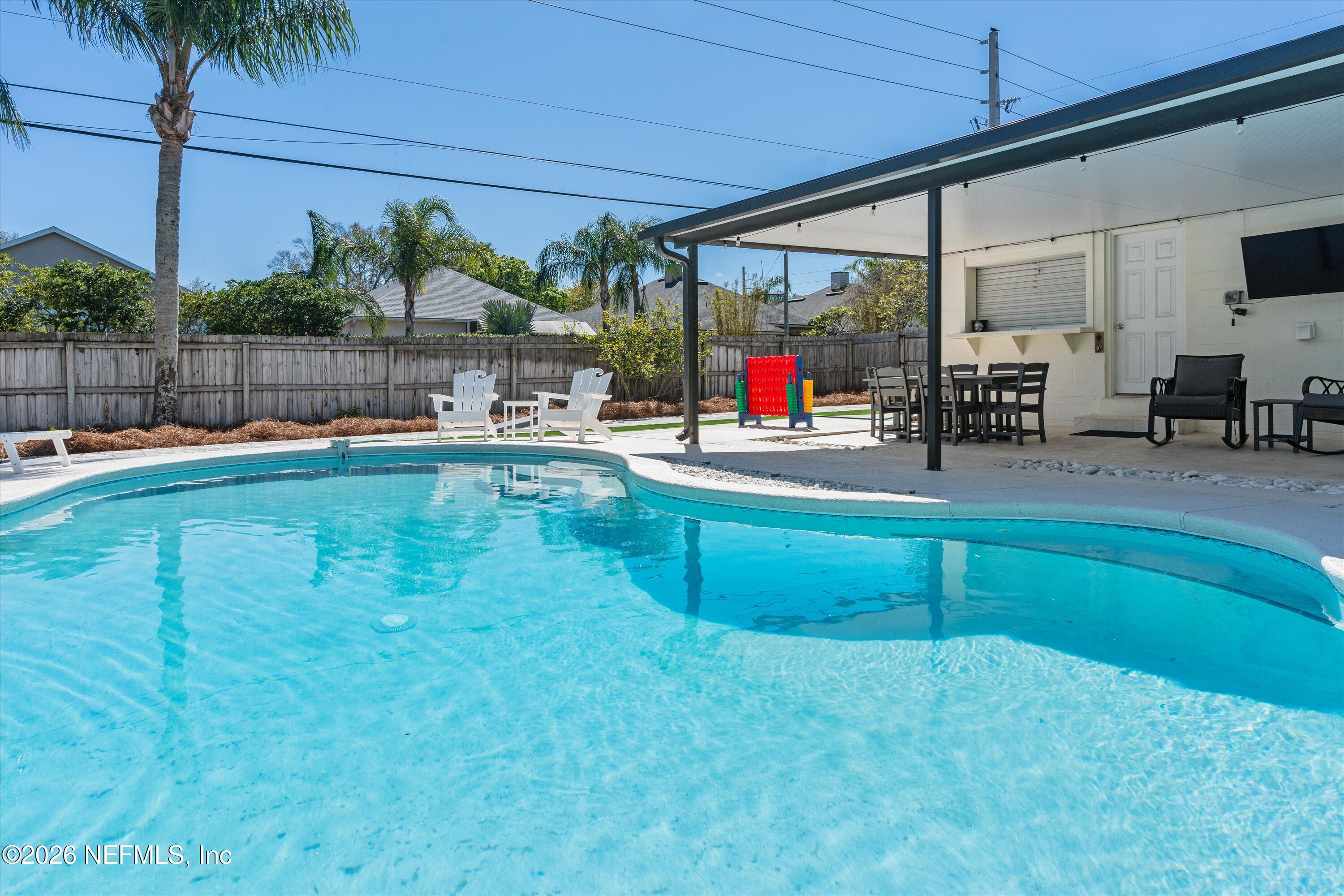 31 Norberta Way Jacksonville Beach, FL 32250 - Photo 4 of 49 a room with pool table and outdoor seating