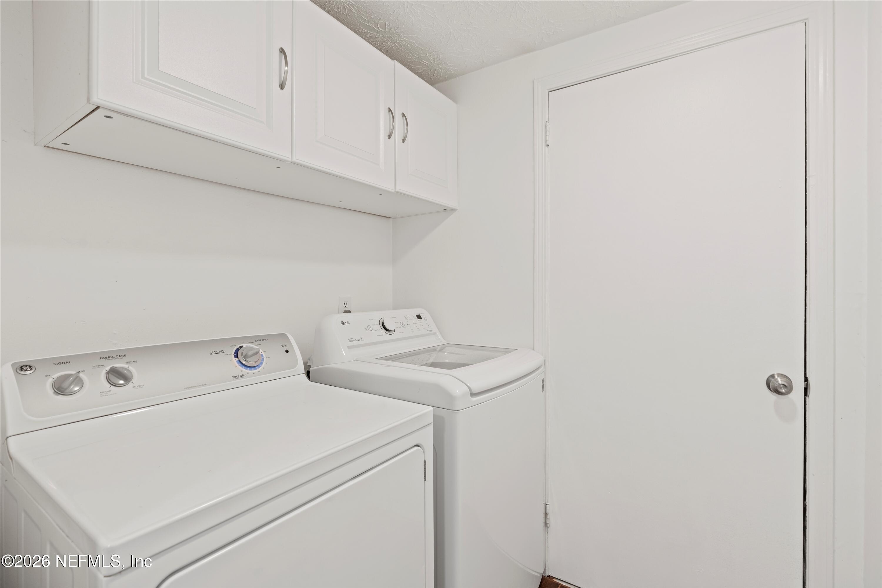 31 Norberta Way Jacksonville Beach, FL 32250 - Photo 43 of 49 a utility room with dryer and washer