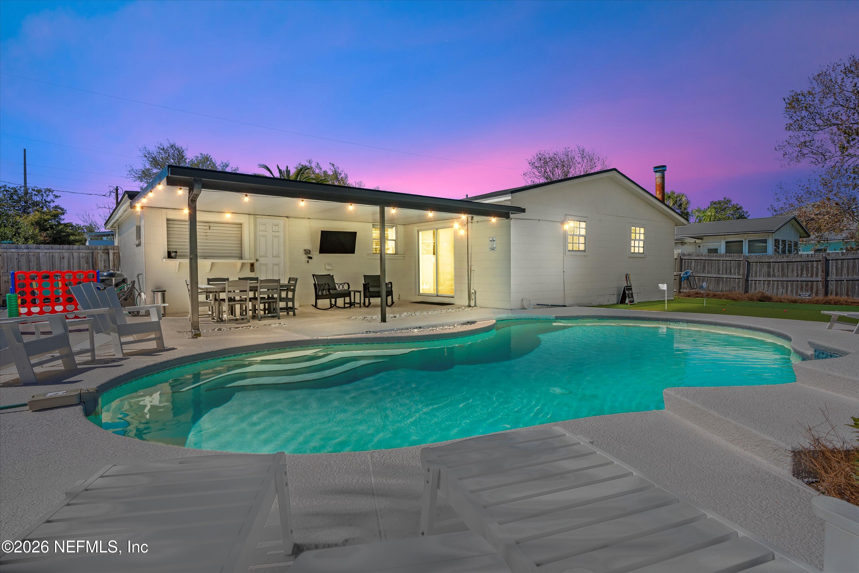 31 Norberta Way Jacksonville Beach, FL 32250 - Photo 44 of 49 a view of a house with a swimming pool