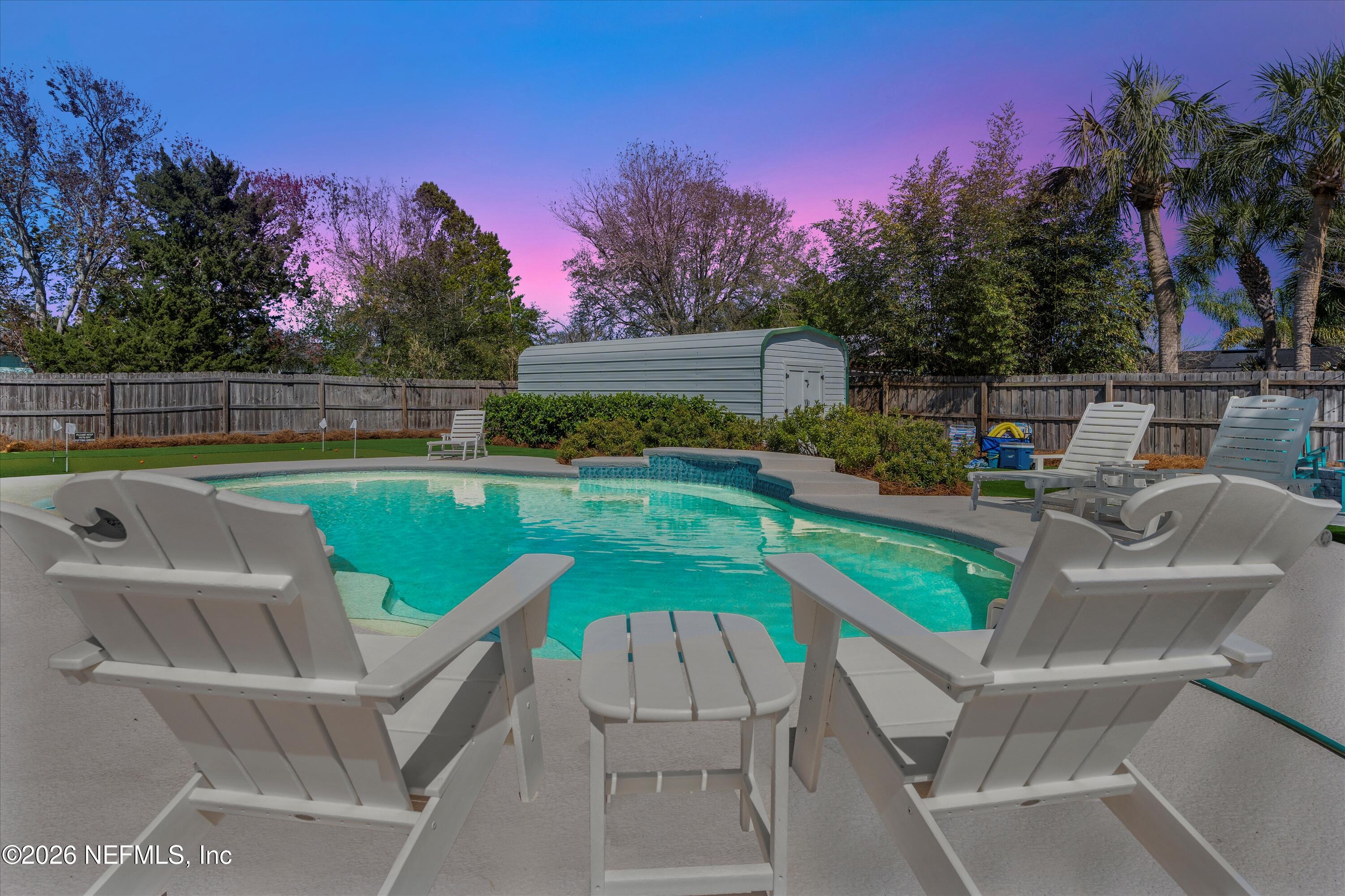 31 Norberta Way Jacksonville Beach, FL 32250 - Photo 45 of 49 a view of a chairs and table on the terrace