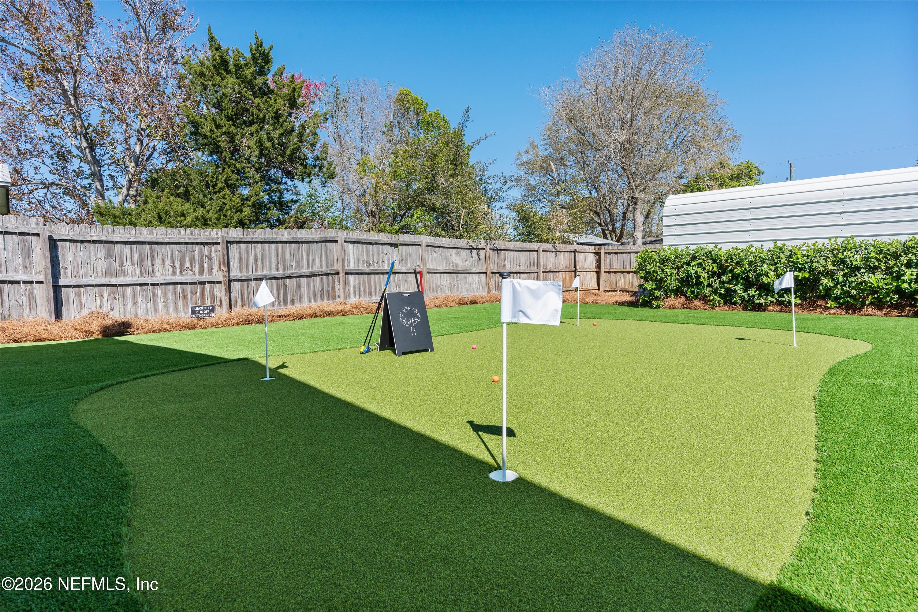 31 Norberta Way Jacksonville Beach, FL 32250 - Photo 10 of 49 a view of a green field with sitting area