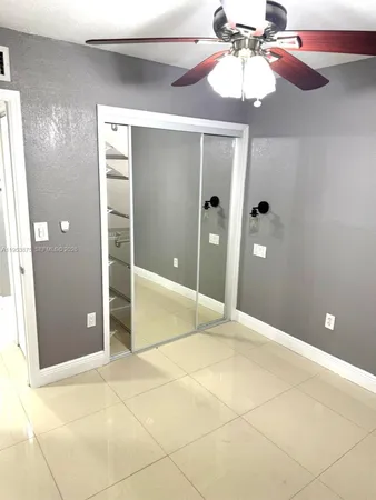 a view of a livingroom with a kitchen