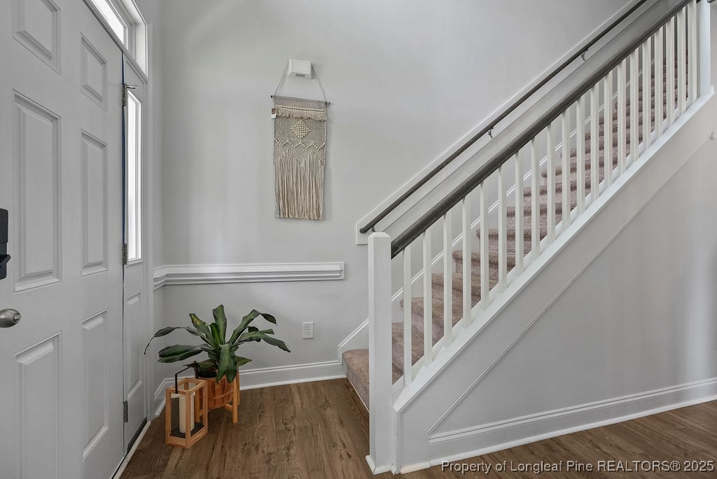 150 Timber Skip Drive Spring Lake, NC 28390 - Photo 20 of 39 a view of entryway with wooden floor