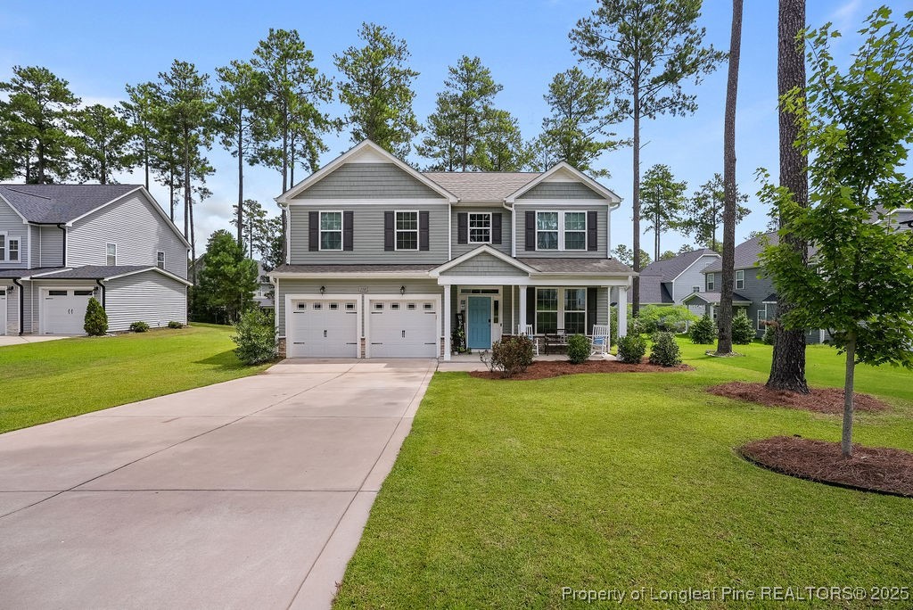150 Timber Skip Drive Spring Lake, NC 28390 - Photo 2 of 39 a front view of a house with yard and green space