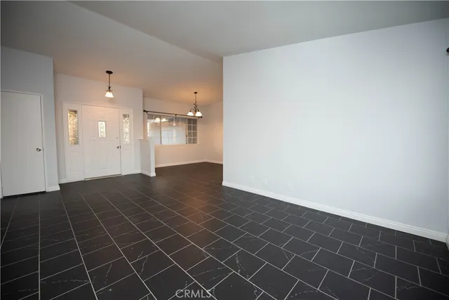 an empty room with a bathroom