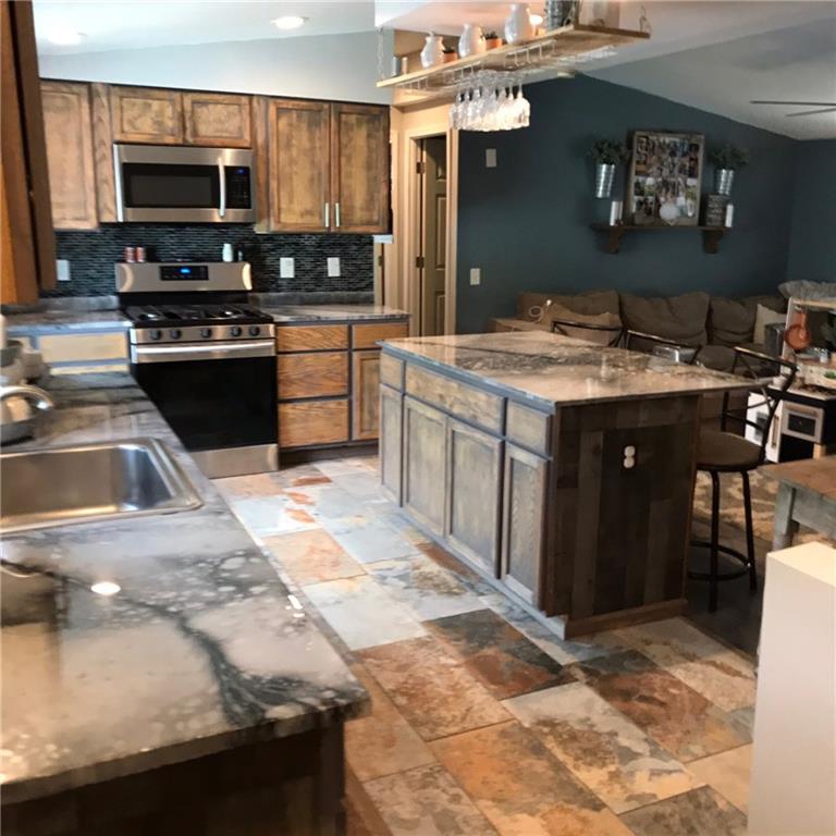 3109 Millers Run Road Cecil, PA 15321 - Photo 3 of 23 This open kitchen is very user friendly & has great functionality.