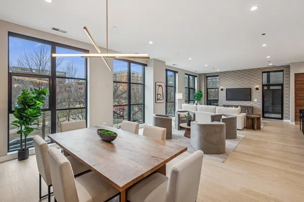 a view of a dining room with furniture window and outside view